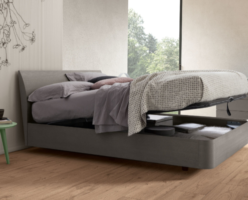 Letto contenitore in legno tinto grigio con testiera curva