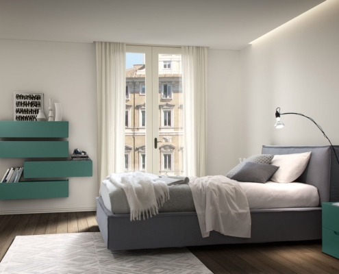 Letto grigio scuro con testata imbottita e contenitore